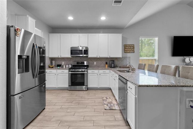 20906 Cypress Overlook Trl, House other with 5 bedrooms, 3 bathrooms and 2 parking in Humble TX | Image 7