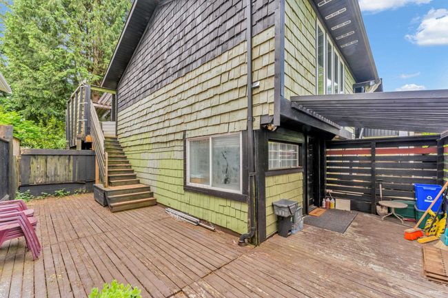 Wooden deck featuring fence and stairs | Image 32