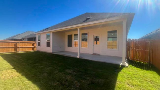 Back of property with a patio and a fenced backyard | Image 14