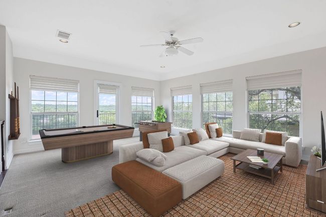 An open family area with built-is ready for another den, game room, media area, , gym. Wonderful Silhouette window treatments. (virtually staged) | Image 4
