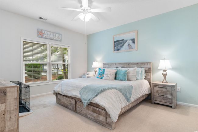 Bedroom featuring carpet, baseboards, and a ceiling fan | Image 14