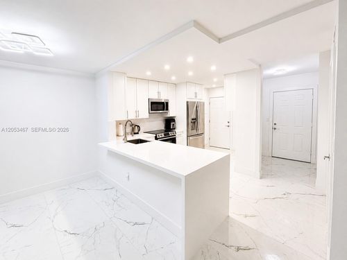 605-1-1750 Ne 191st St, Miami, FL, 33179-4284 | Card Image