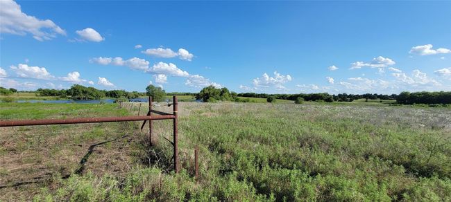View of yard featuring a rural view. | Image 11