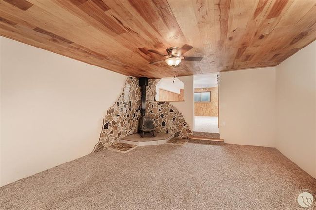 Basement famimy room with wood stove | Image 26