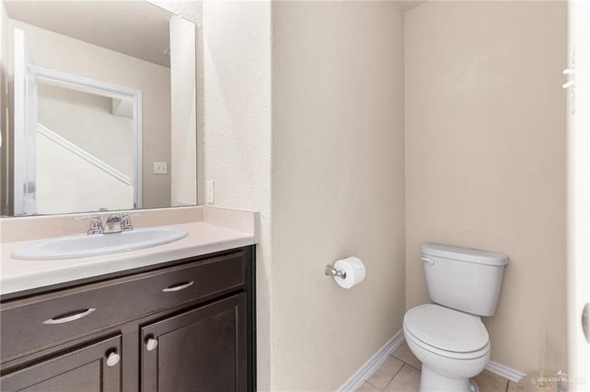 Bathroom with vanity and tile patterned floors | Image 17