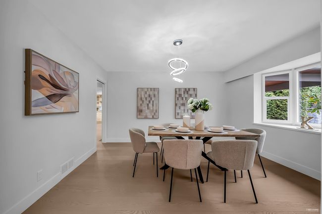 Dining room with baseboards | Image 29