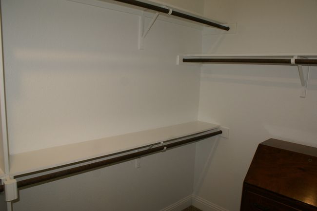 View of spacious closet | Image 22