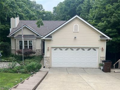 View of front of home featuring a garage | Image 1