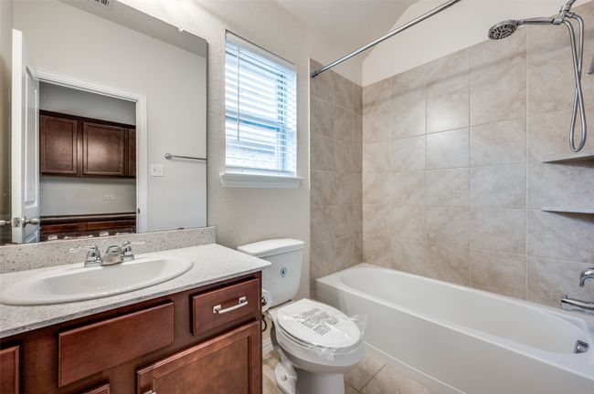 Full bath with tub / shower combination, vanity, and toilet | Image 22