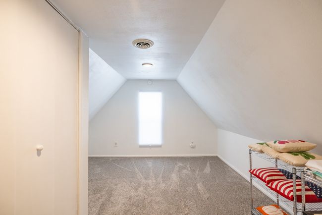 Bonus room featuring carpet flooring, lofted ceiling, and baseboards | Image 14