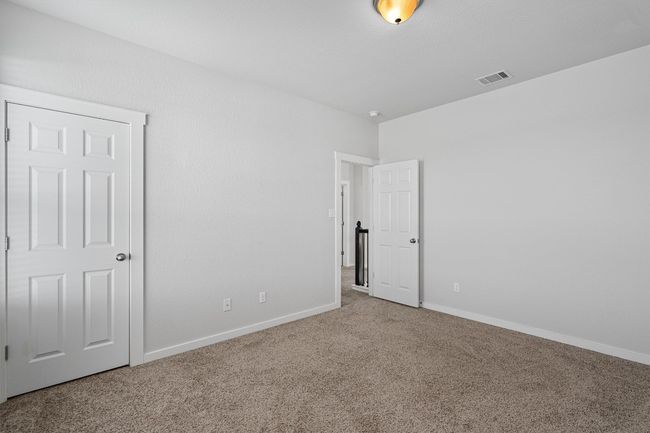 Unfurnished bedroom featuring carpet and baseboards | Image 30