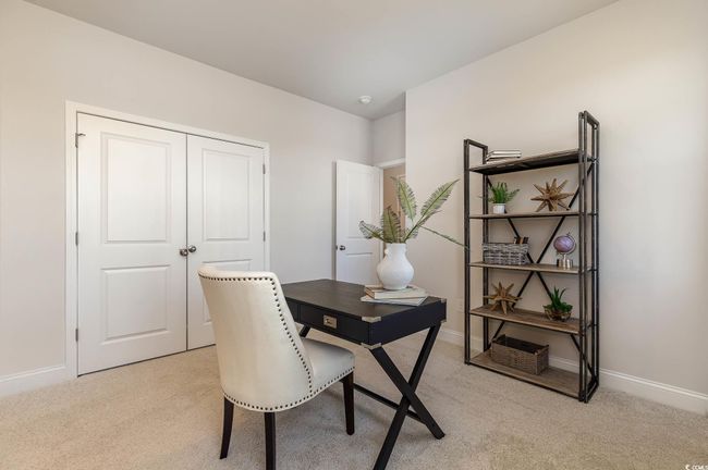 Office featuring light colored carpet and baseboards | Image 32