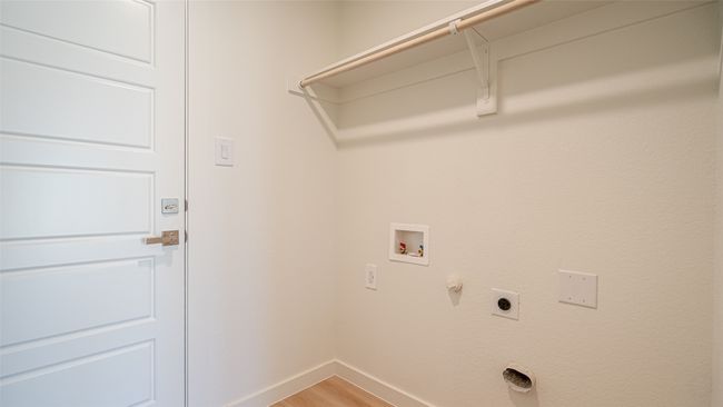 Full sized laundry room between the kitchen and the garage | Image 13