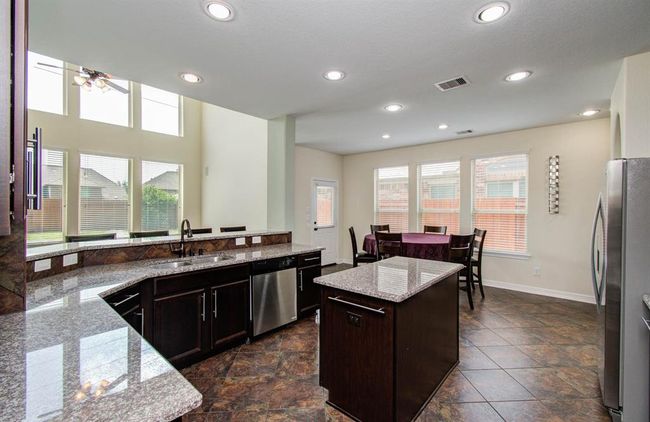10506 Hartfield Bluff Ln, House other with 4 bedrooms, 4 bathrooms and 2 parking in Cypress TX | Image 10