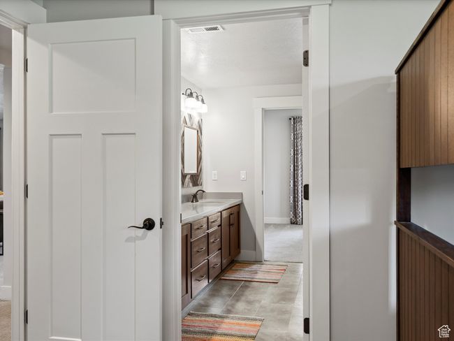 Bathroom with vanity and baseboards | Image 33