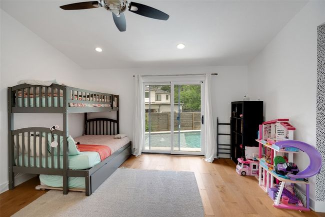 2nd primary bedroom featuring access to the pool area. | Image 21