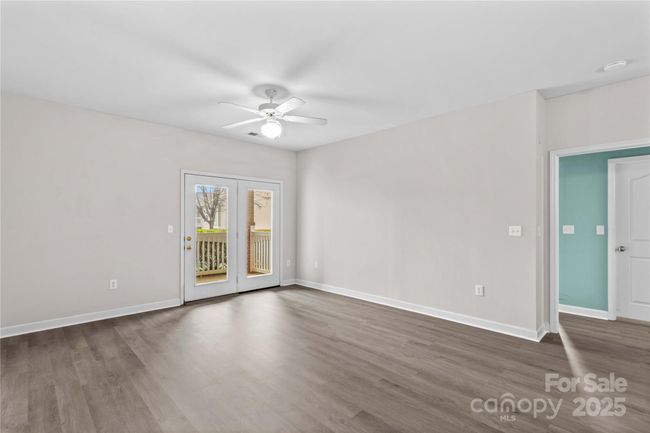 Living Room with French Door opens to covered porch area | Image 28