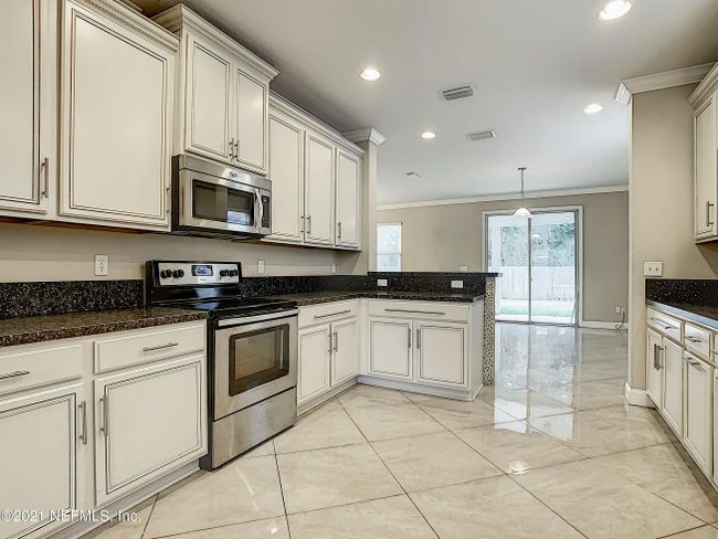 9610 Abby Glen Cir, Home with 4 bedrooms, 3 bathrooms and null parking in Jacksonville FL | Image 14