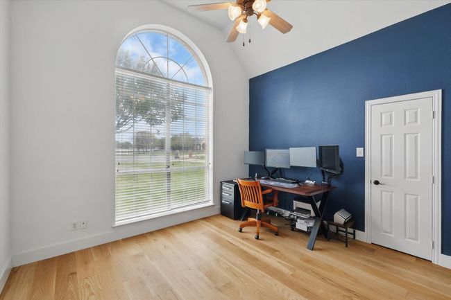Office with French doors faces front of home. Alternatively may be used as a 4th bedroom, complete with full closet. | Image 23