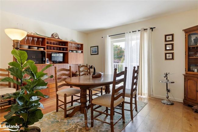 Dining Area looking out to front of apartment | Image 14