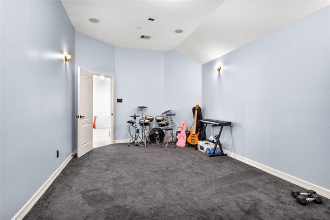 Media room is located just off the upstairs game room. | Image 35