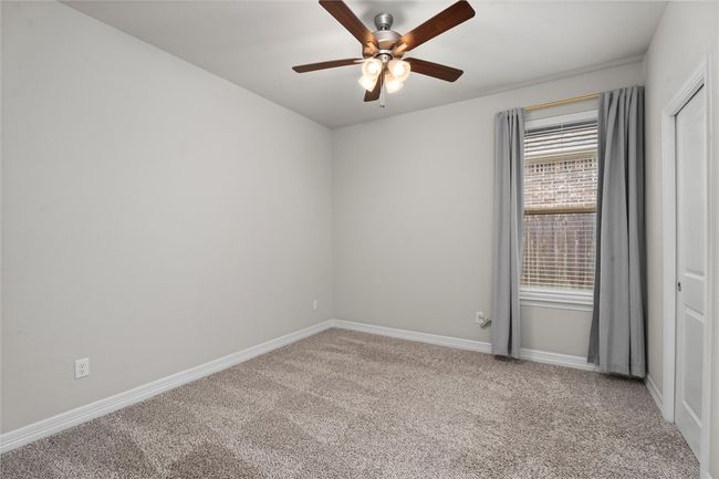 Laundry area featuring separate washer and dryer, laundry area, and baseboards | Image 27