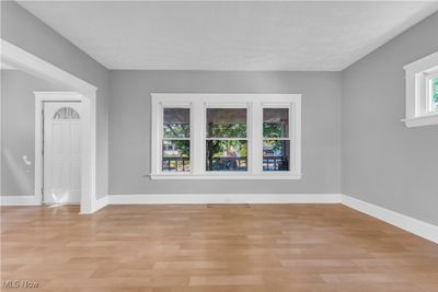 Empty room featuring light hardwood / wood-style floors | Image 3