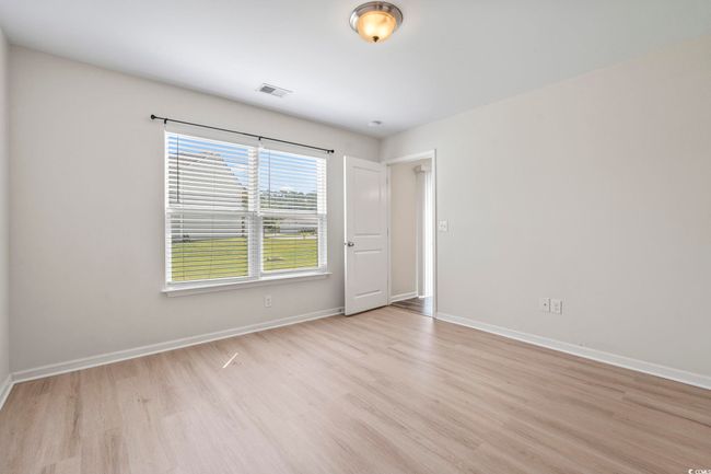 Master bedroom featuring wood finished floors | Image 19