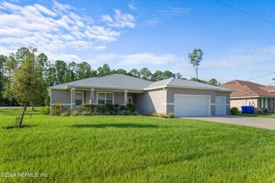 54 Riddle Drive, House other with 3 bedrooms, 2 bathrooms and null parking in Palm Coast FL | Image 1