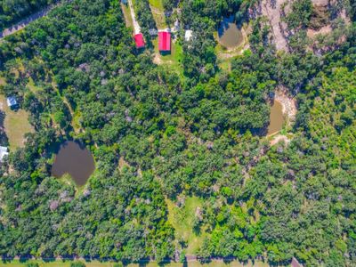 Drone / aerial view featuring a water view | Image 1