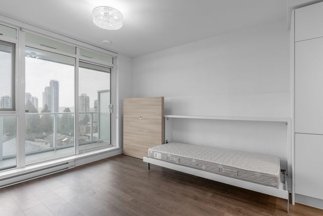 Interior space with a wealth of natural light and wood finished floors | Image 5