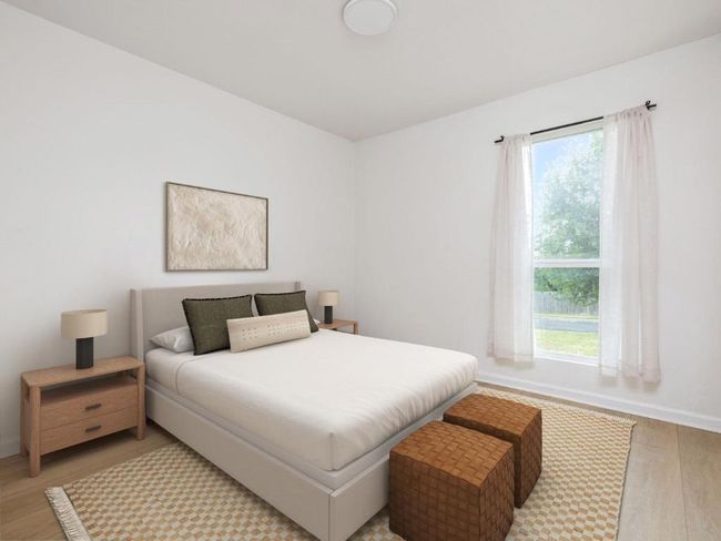 Bedroom featuring light wood-type flooring and baseboards | Image 16