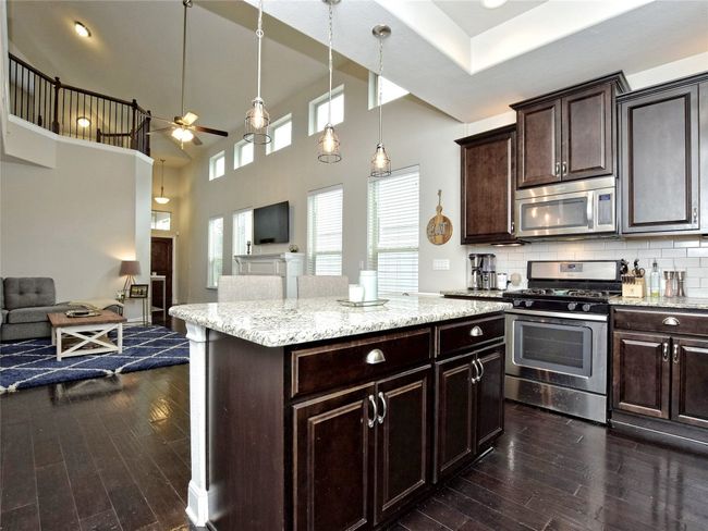 View from kitchen to great room. | Image 10