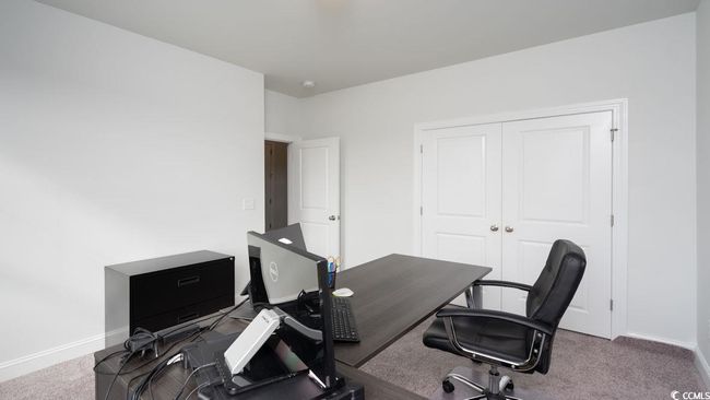 Carpeted home office featuring baseboards | Image 31