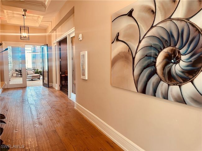 Community Amenities with ornamental molding, french doors, coffered ceiling, and hardwood / wood-style floors | Image 45