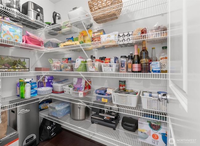 The walk-in pantry offers additional storage space! | Image 13