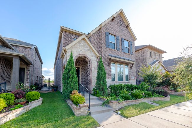 View of front facade featuring brick siding | Image 4