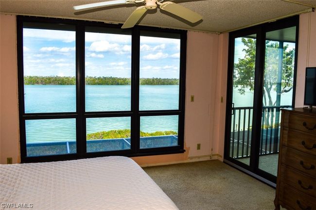 OWNER'S SUITE ESTERO BAY VIEWS. ENTRANCE TO LANAI SHOWN AT RIGHT. | Image 24