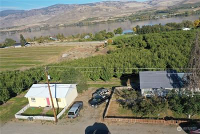 Both houses and the orchard | Image 1