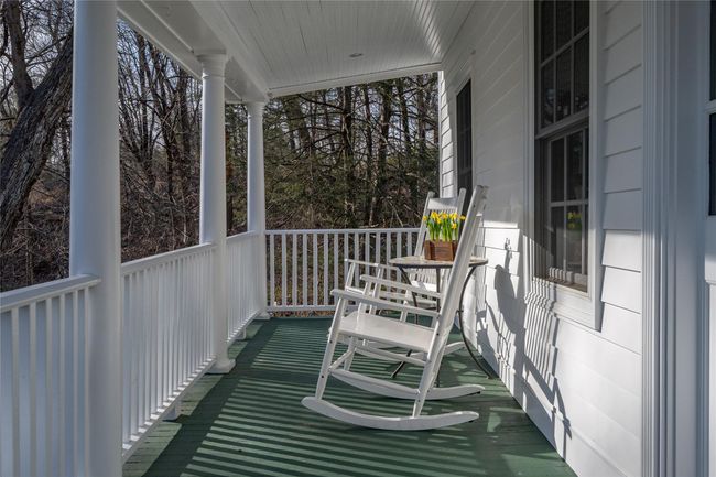Rocking Chair Front Porch with Wainscott Ceiling | Image 26