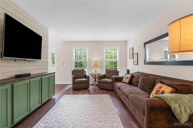 Living room featuring dark wood finished floors | Image 14