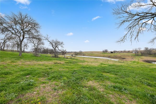 View of yard featuring a water view and a rural view | Image 13