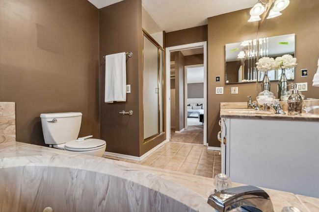 32 Pump Hill Mews Sw, Home with 4 bedrooms, 3 bathrooms and 4 parking in Calgary AB | Image 25