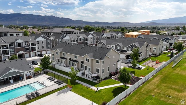 Aerial view of residential area featuring a mountainous background | Image 38