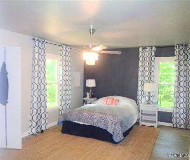 Bedroom with baseboards and a ceiling fan | Image 16