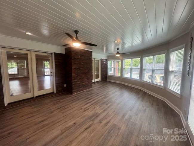Great sunroom provides secondary living space- mini split for comfort all seasons | Image 28