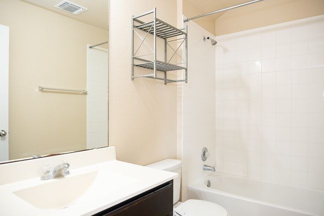 Full bath with toilet, vanity, and tub / shower combination | Image 22