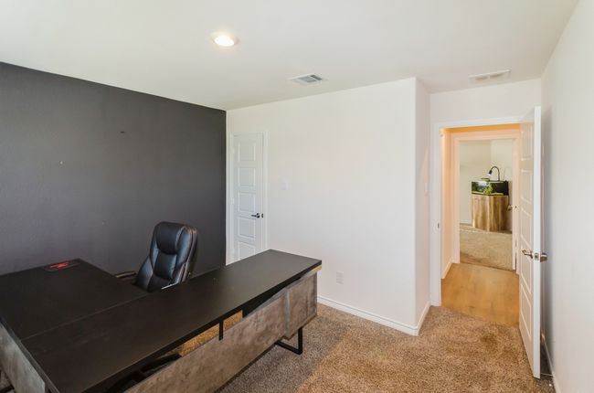 Carpeted home office with baseboards | Image 23