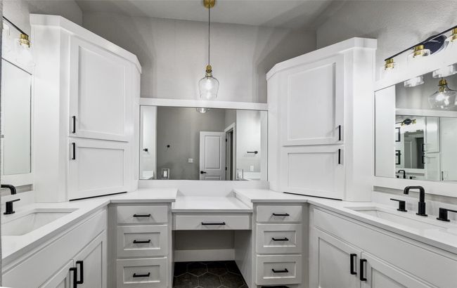 Bathroom featuring tile patterned floors and vanity | Image 10