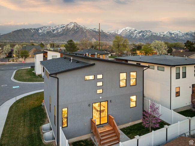 Exterior space featuring fence and a mountain view | Image 41